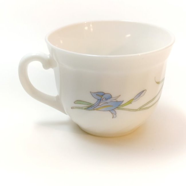 Centered front view of a white tempered glass coffee cup with blue iris pattern by Arcopal France on a white background